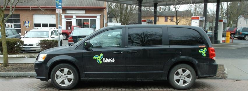 Ithaca Carshare vehicle parked near the shop frontage